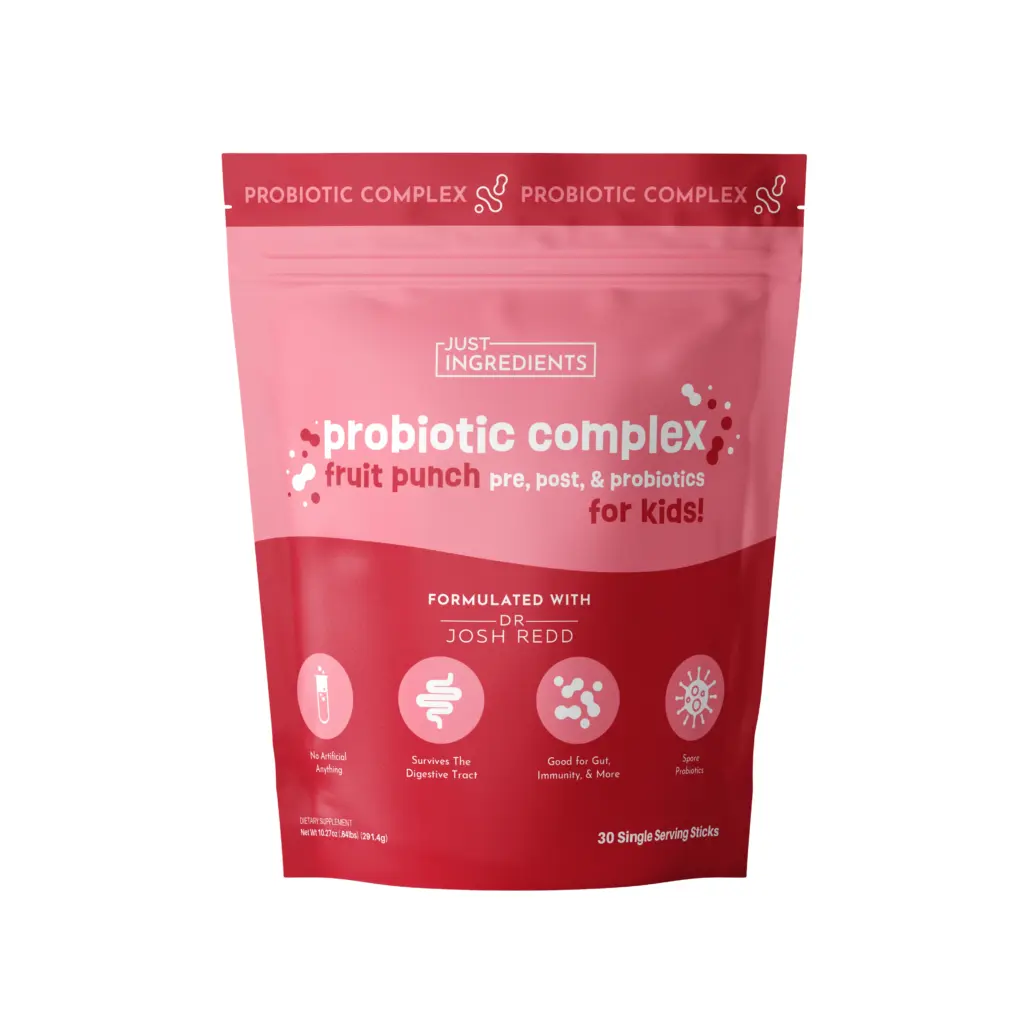 A red and pink pouch labeled "Probiotic Complex Fruit Punch for Kids" from Just Ingredients, featuring icons and text about health benefits, 30 single serving sticks, plus a note to use a Just Ingredients Coupon Code for extra savings.