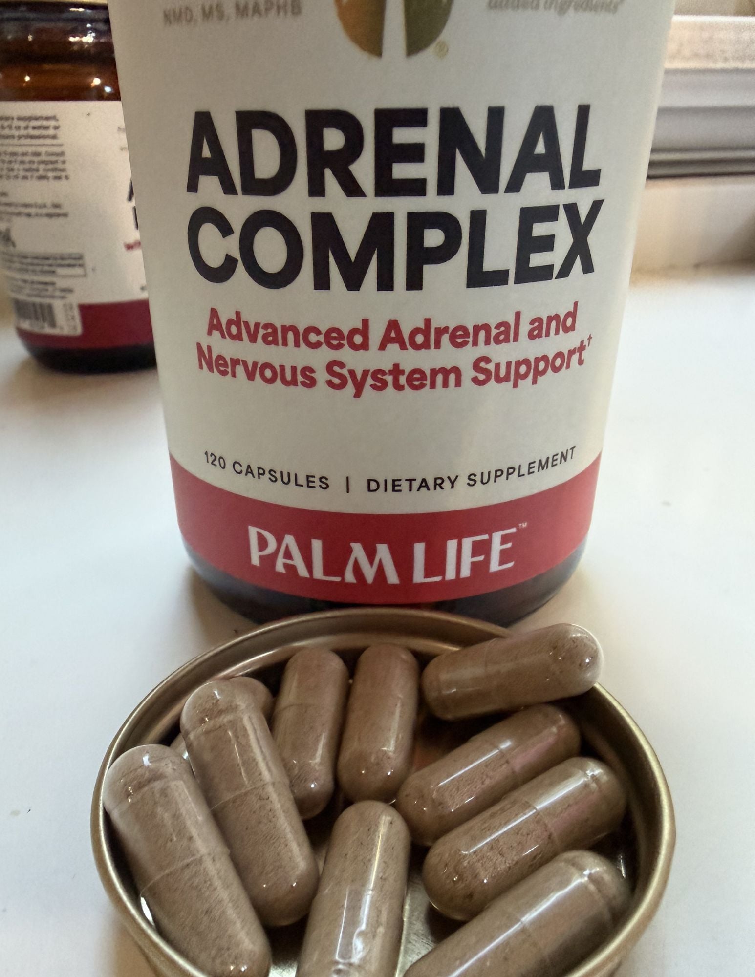 bottle of Palm Life Adrenal Complex